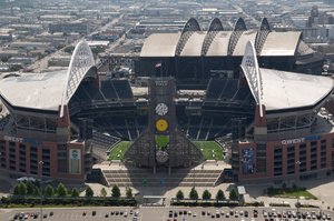 Construction on the Seattle Seahawks' new stadium continues Wednesday,  March 27, 2002, in this view looking north toward downtown Seattle. The  team will begin playing in the 67,000-seat stadium this fall. The